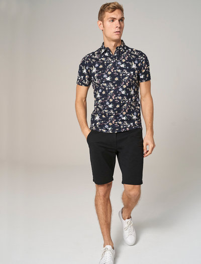 floral polo and short outfit