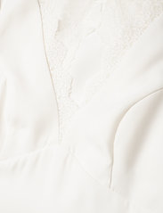by malina leone gown