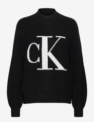 calvin klein black and white sweater