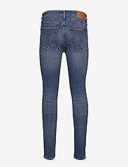 Super Skinny Ab038 Mid Blue 49 95 Calvin Klein Jeans Boozt Com