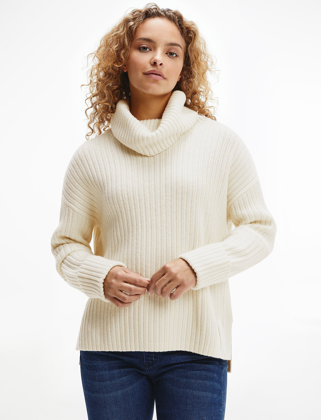 white chunky polo neck jumper