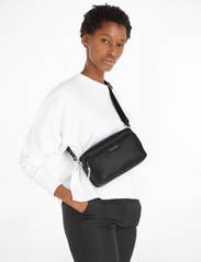 CK Must Camera Bag With Pocket by Calvin Klein Online