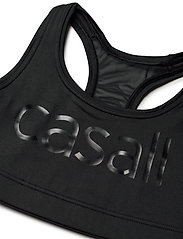 Casall - Iconic wool sports bra - high support - black logo - 2