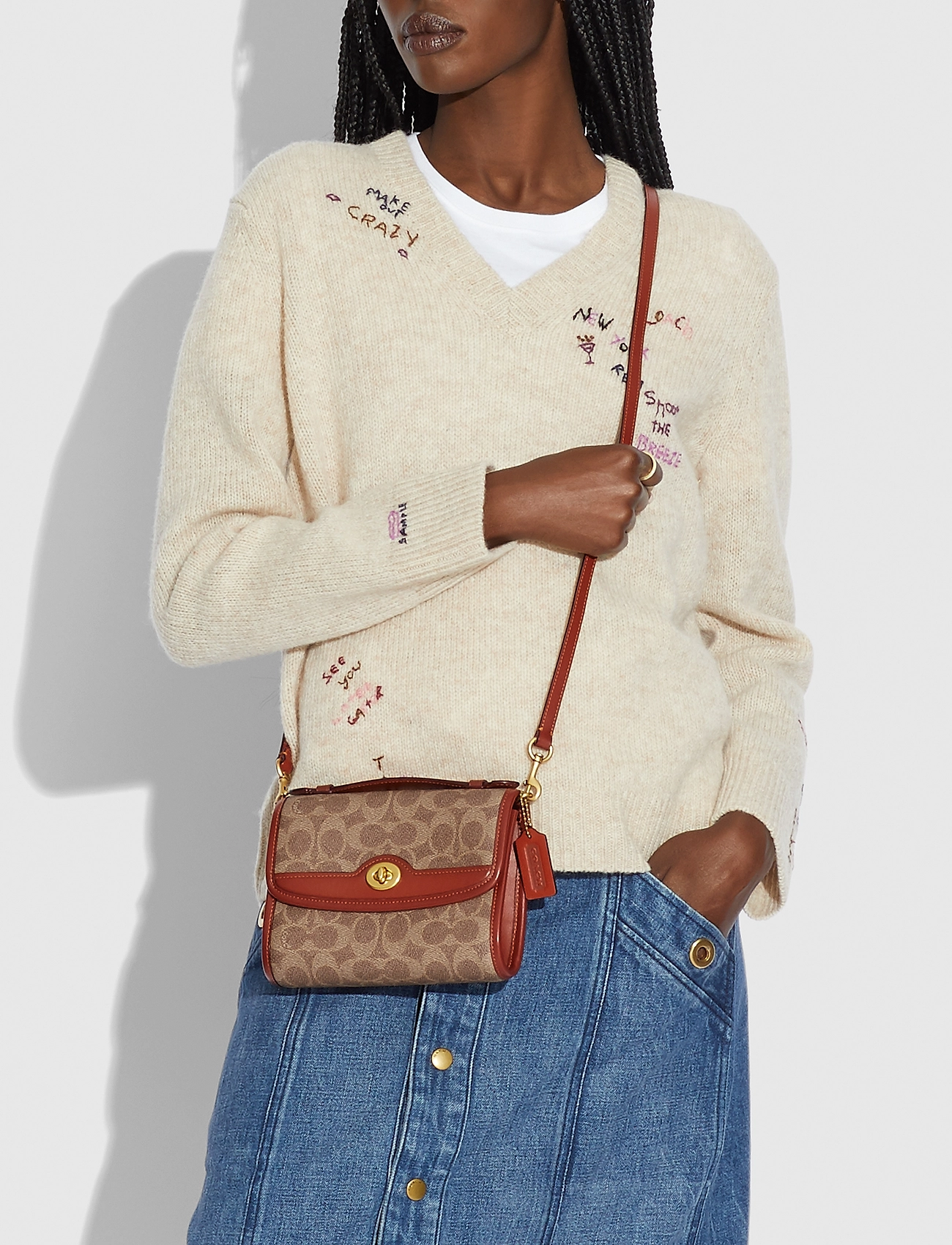 coach bag with red roses