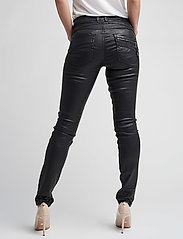 cream bibiana coated jeans