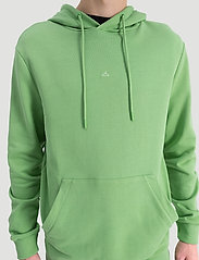 holzweiler green hoodie