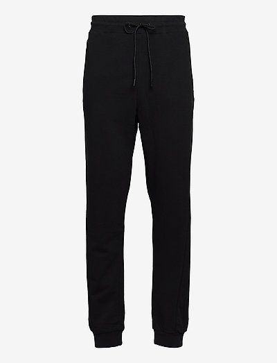 hmlISAM REGULAR PANTS - sweatpants - black