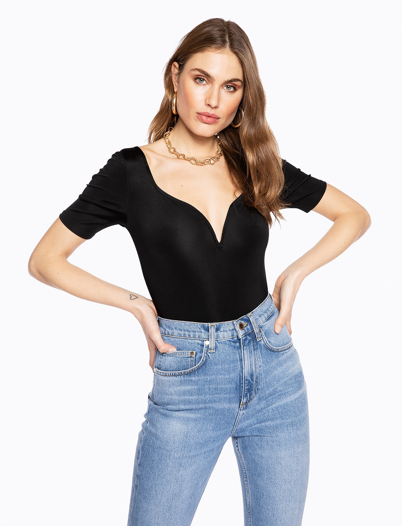 black plunging neckline top