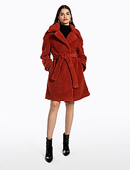 belted teddy coat