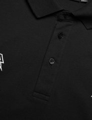 J. Lindeberg Golf - JL Strike Embroidery Jersey - kurzärmelig - black - 2