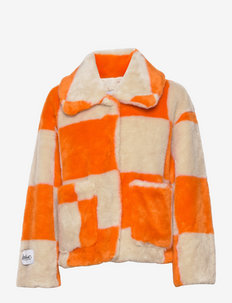 Traci - fuskpäls - orange checkerboard