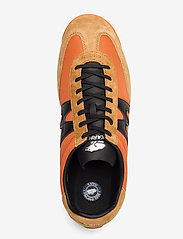 karhu championair jaffa orange
