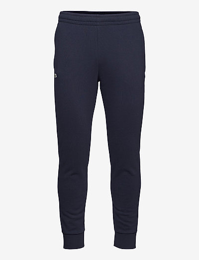 TRACKSUITS & TRACK TR - sweatpants - navy blue