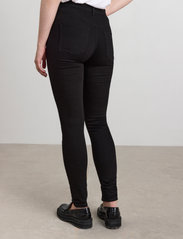 Lindex - Trousers denim Vera stay black - slim jeans - black - 5