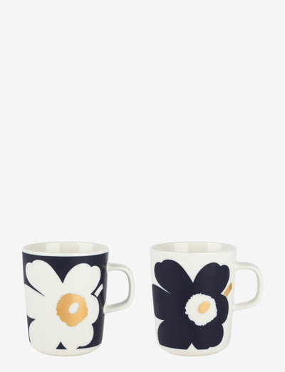 White and dark blue mugs