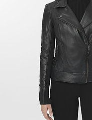 iman leather jacket