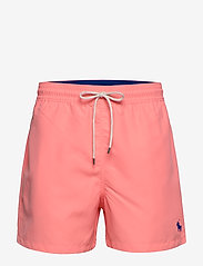 neon pink swim trunks