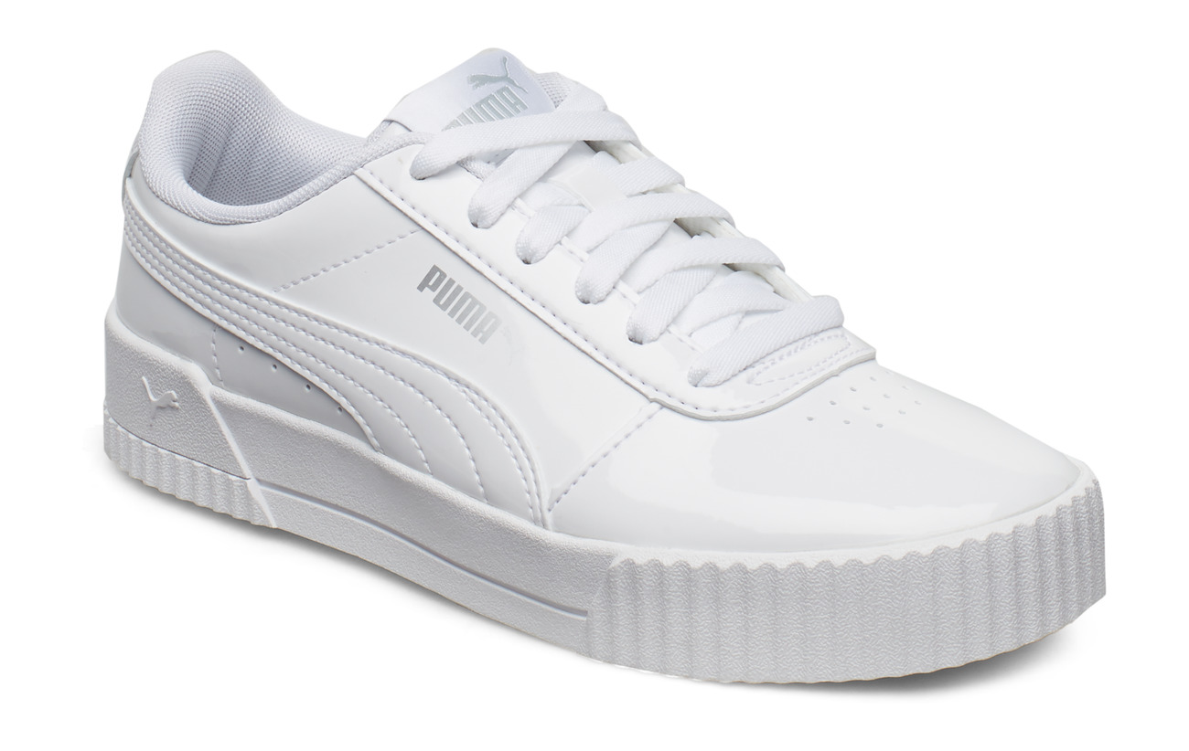 white puma carina sneakers