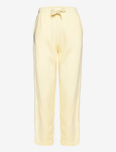 Cropped trousers - joggers - pale yellow