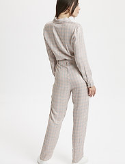 jumpsuit soaked in luxury