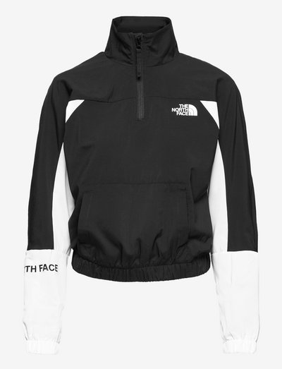 white and black north face windbreaker