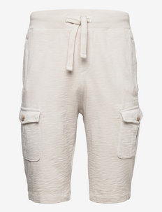 naturally dyed sweatshorts - cargo shorts - soft buttercream