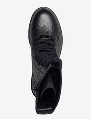 monochromatic lace up boot