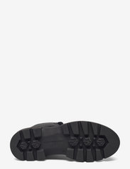 monochromatic lace up boot