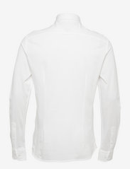 Tommy Hilfiger - SLIM SOLID KNITTED SHIRT - custom color white - 1